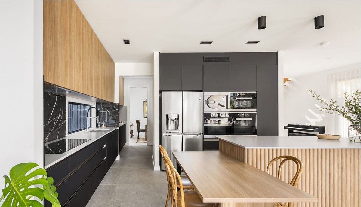 Kitchen with a fluted timber island