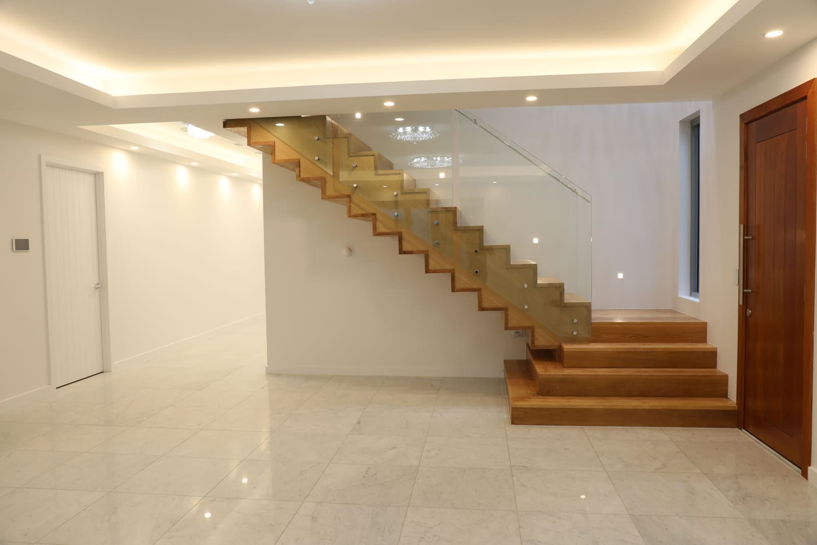Open-plan living with a floating timber stair