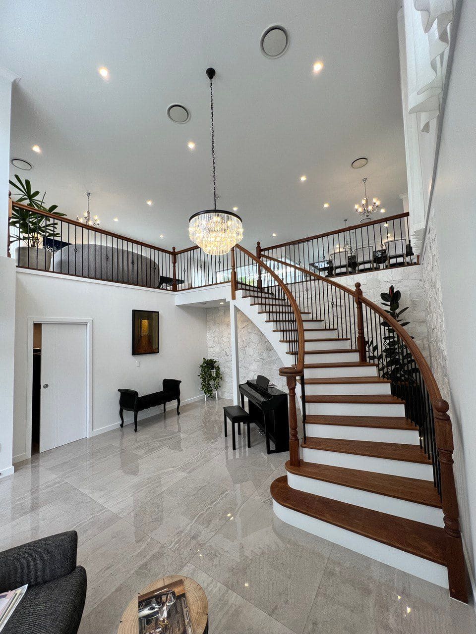 Curved staircase in the entry hall