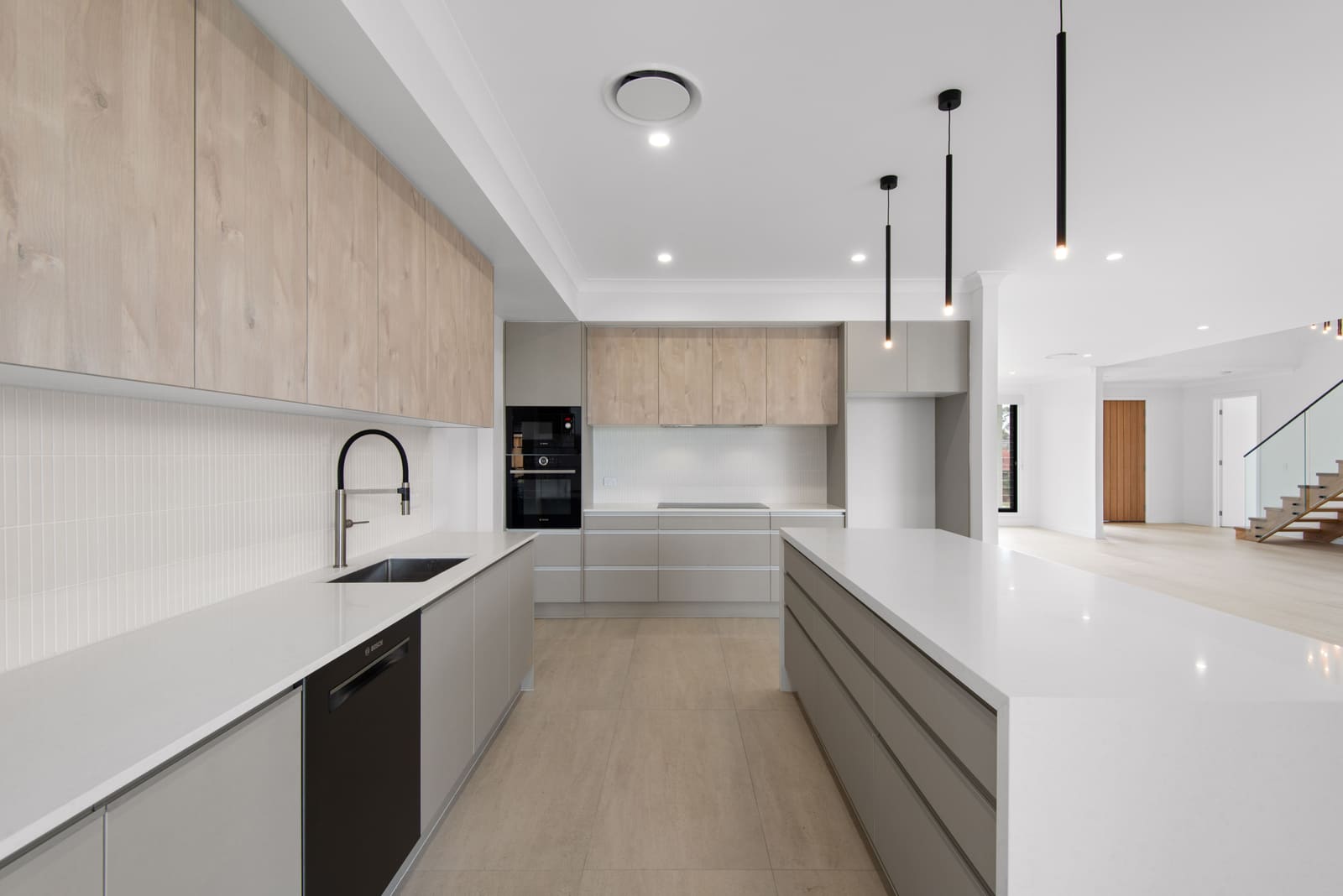 Kitchen with island bench and pendant lights