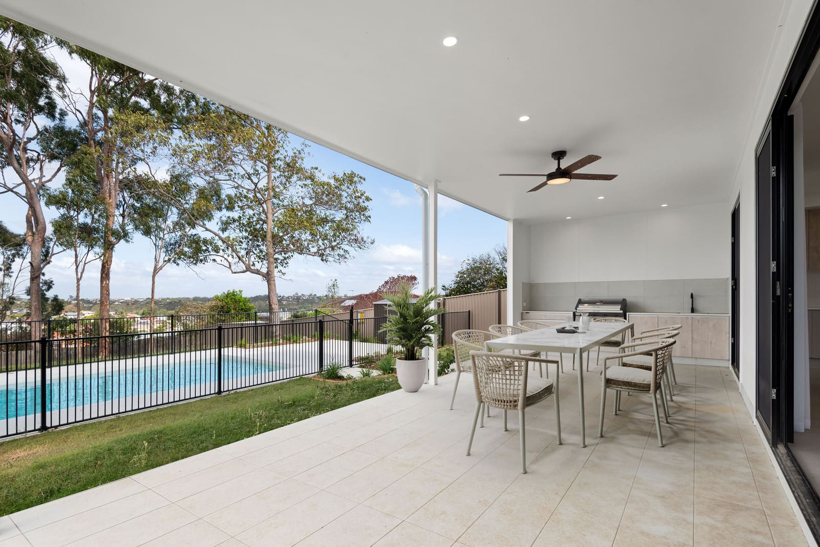 Covered alfresco overlooking the pool