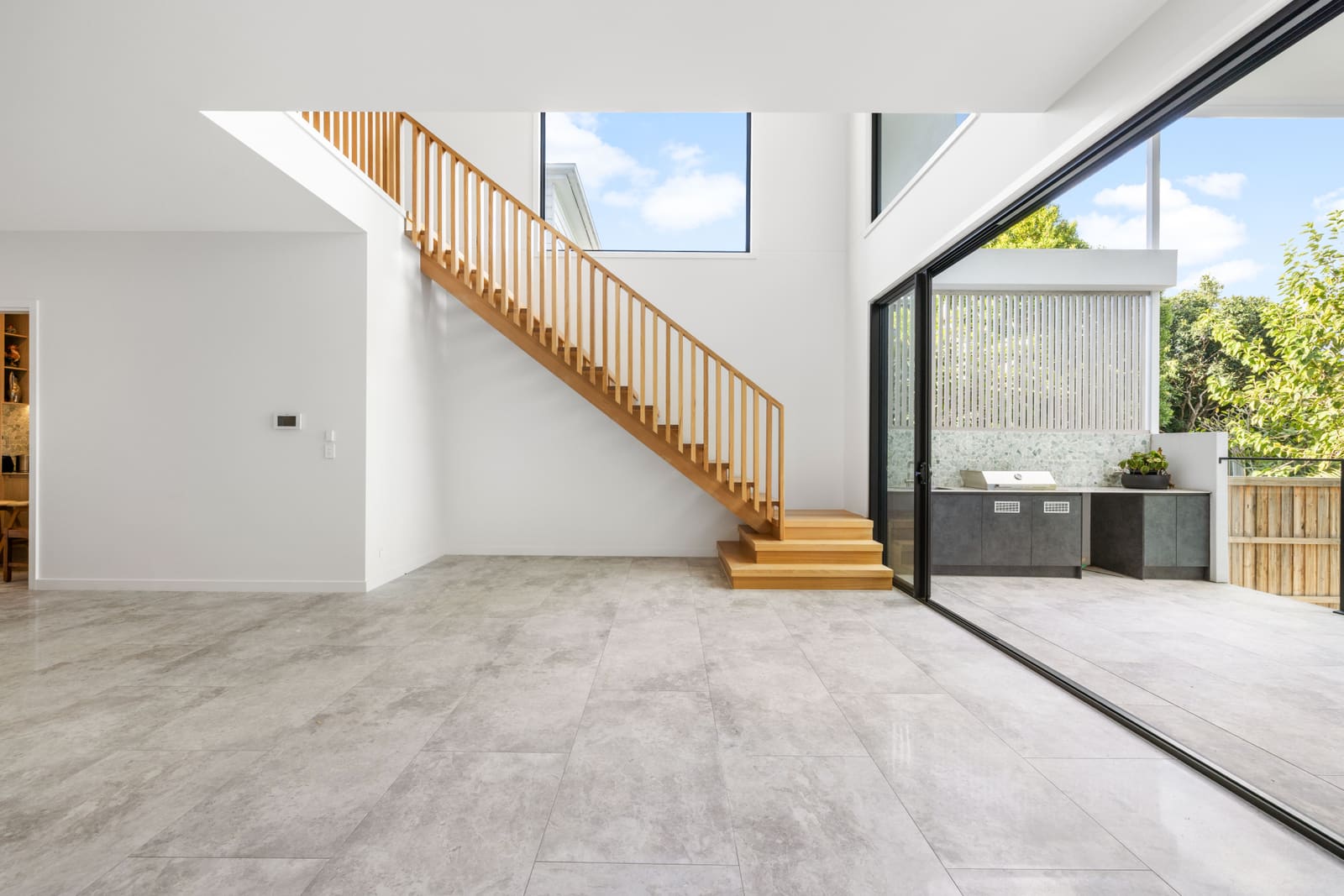 Living room with the stair and garden outlook