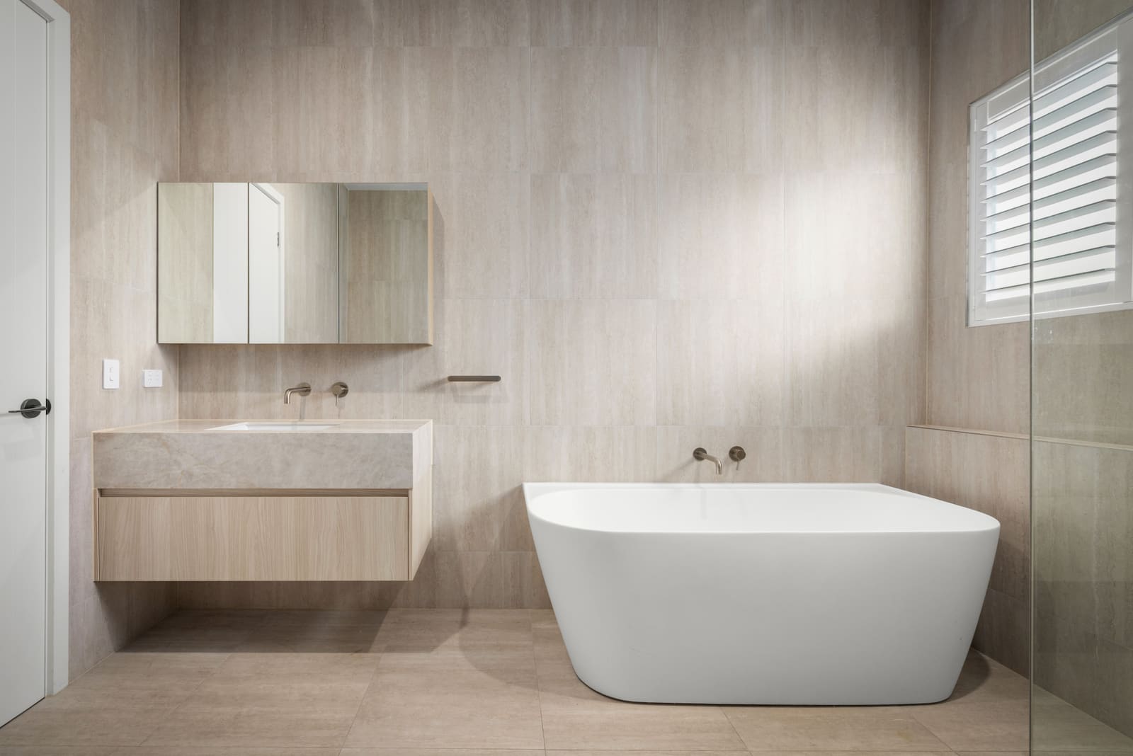 Bathroom with a freestanding bath