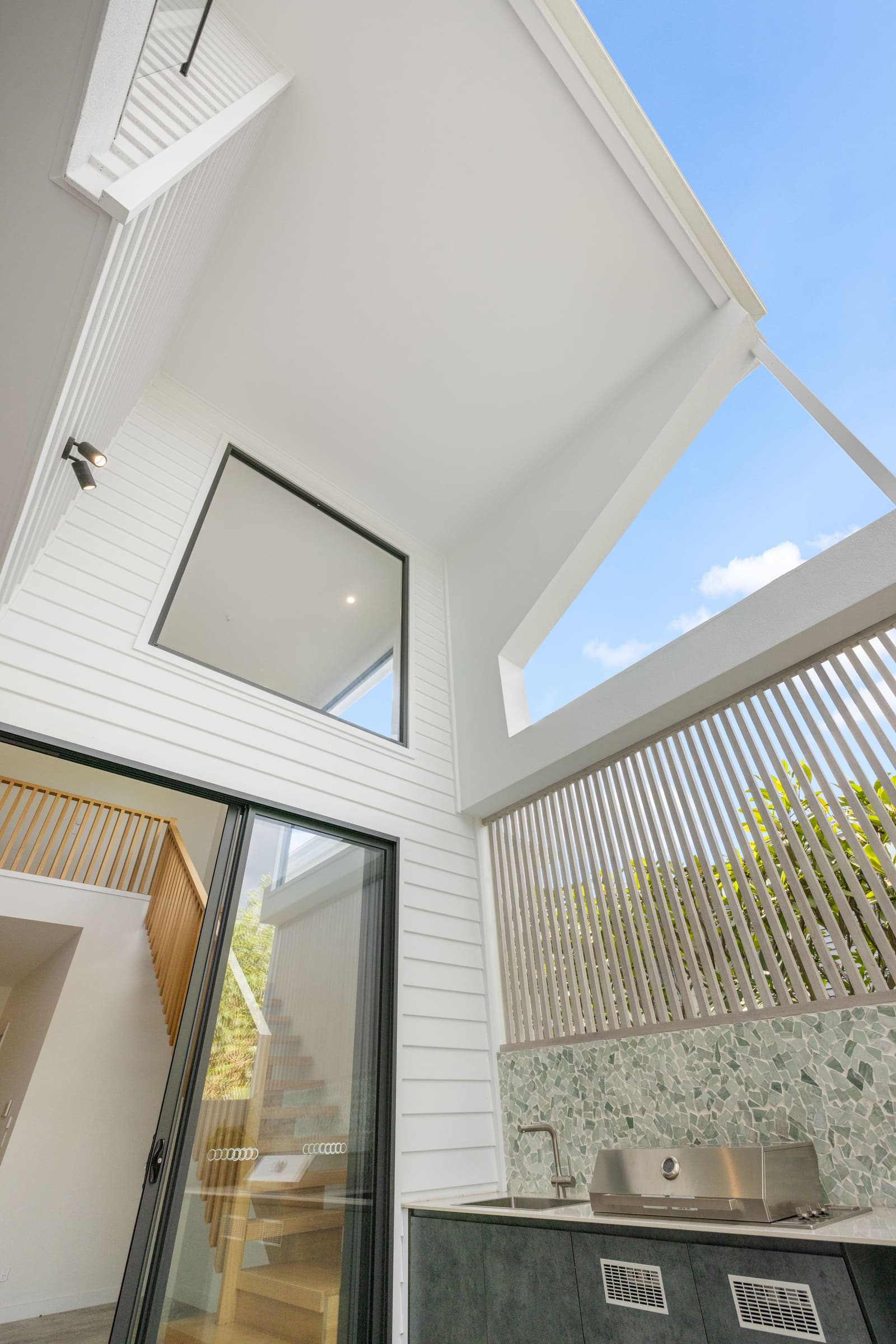 Rear facade detail above the outdoor kitchen