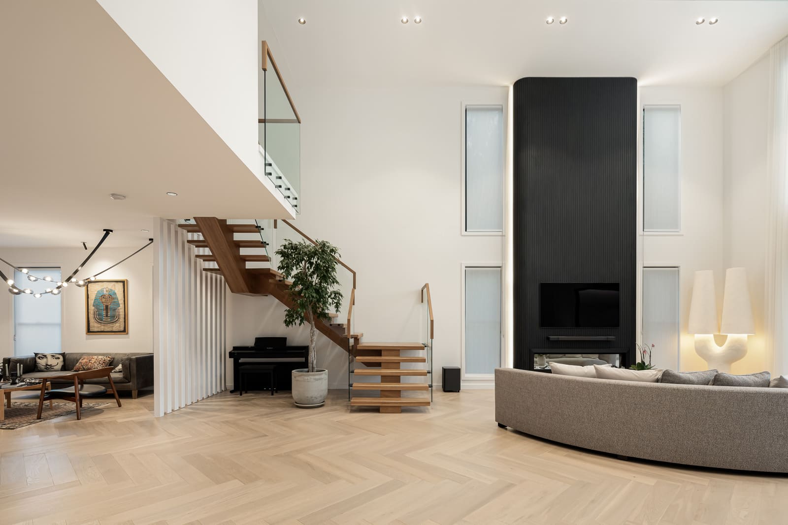 Floating stair and the double-height living room